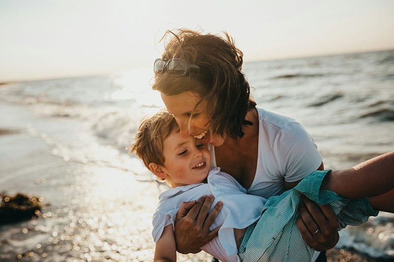 Woman Holding Child