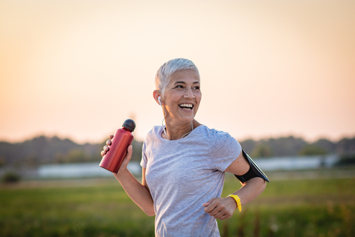 Mature Woman Running on the running track